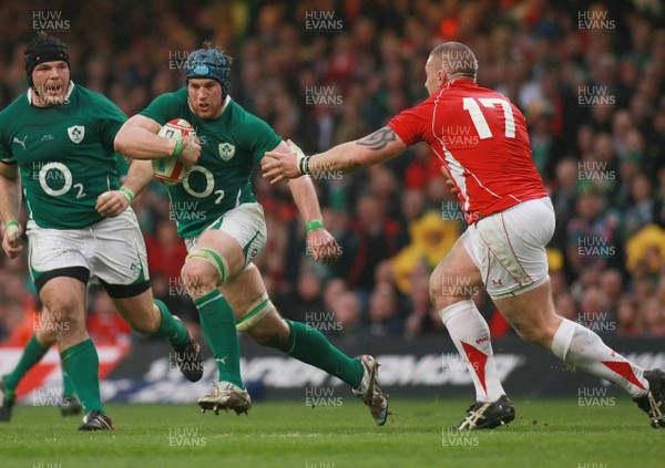 12.03.11 Wales v Ireland - RBS 6 Nations Championship-  Ireland's Sean O'Brien takes on Wales' John Yapp. 