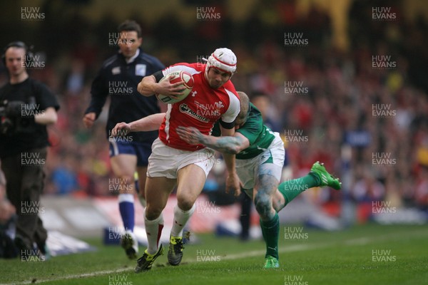 12.03.11 Wales v Ireland ... Wales Leigh Halfpenny is tackled by Ireland's Keith Earls. 