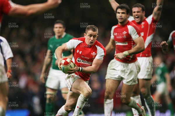 12.03.11 Wales v Ireland ... Wales Shane Williams kicks the ball out to end the game and victory for Wales. 