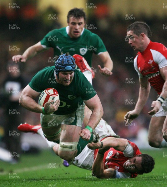 12.03.11 Wales v Ireland ... Ireland's Sean O'Brien is brought down by Lee Byrne. 