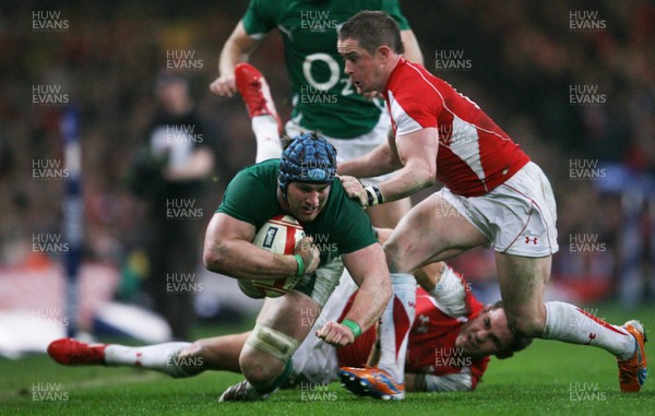 12.03.11 Wales v Ireland ... Ireland's Sean O'Brien is brought down by Lee Byrne. 