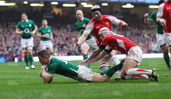 12.03.11... Wales v Ireland, RBS 6 Nations -  Ireland's Brian O'Driscoll dives in to score try 