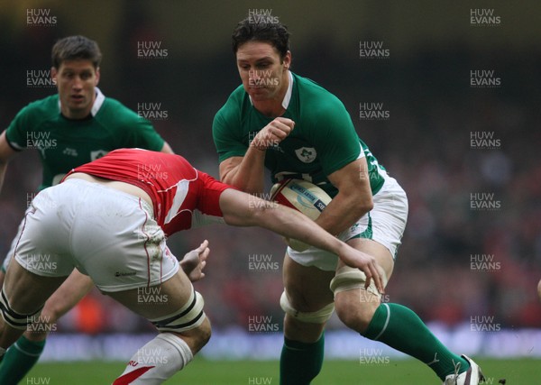 12.03.11... Wales v Ireland, RBS 6 Nations -  Ireland's David Wallace is tackled by Wales' Ryan Jones   