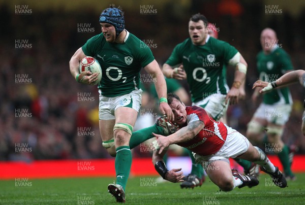 12.03.11... Wales v Ireland, RBS 6 Nations -  Ireland's Sean O'Brien gets away from Wales' Matthew Rees 