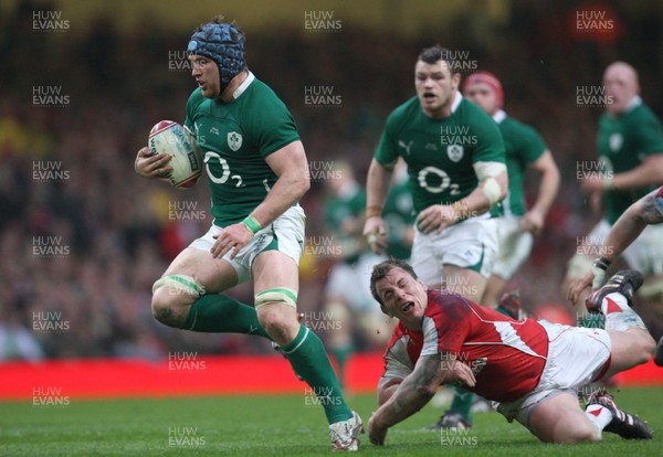 12.03.11... Wales v Ireland, RBS 6 Nations -  Ireland's Sean O'Brien gets away from Wales' Matthew Rees 