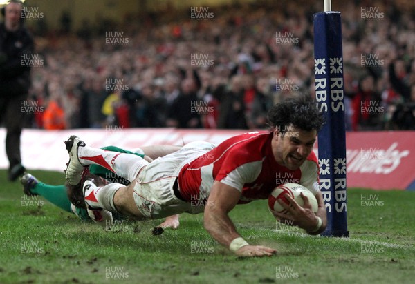 12.03.11... Wales v Ireland, RBS 6 Nations -  Wales' Mike Phillips dives in to score try 