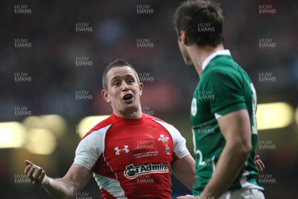 12.03.11... Wales v Ireland, RBS 6 Nations -  Wales' Shane Williams explains the situation to Ireland's Tommy Bowe   