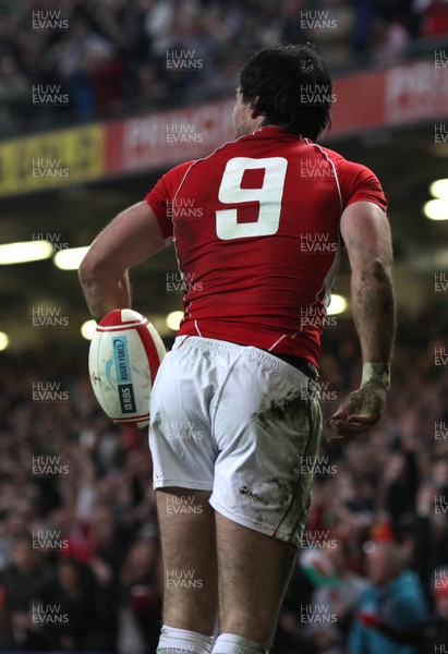 12.03.11... Wales v Ireland, RBS 6 Nations -  Wales' Mike Phillips gets up with the ball after scoring try 