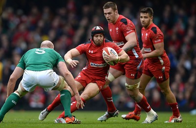 140315 - Wales v Ireland - RBS 6 Nations 2015 -Leigh Halfpenny of Wales takes on Paul O’Connell of Ireland