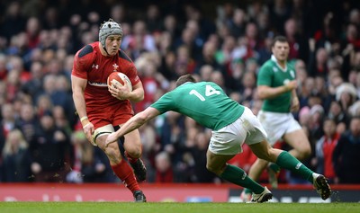 140315 - Wales v Ireland - RBS 6 Nations 2015 -Jonathan Davies of Wales is tackled by Tommy Bowe of Ireland