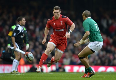 140315 - Wales v Ireland - RBS 6 Nations 2015 -George North of Wales chips past Simon Zebo of Ireland