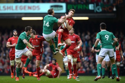 140315 - Wales v Ireland - RBS 6 Nations 2015 -Liam Williams of Wales and Tommy Bowe of Ireland compete for high ball