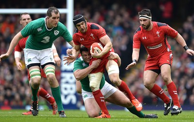 140315 - Wales v Ireland - RBS 6 Nations 2015 -Sam Warburton of Wales is tackled by Mike Ross of Ireland