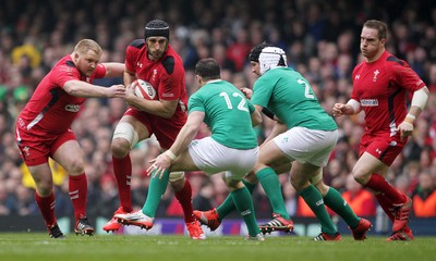 140315 - Wales v Ireland - RBS 6 Nations - Luke Charteris of Wales takes on Robbie Henshaw and Rory Best of Ireland