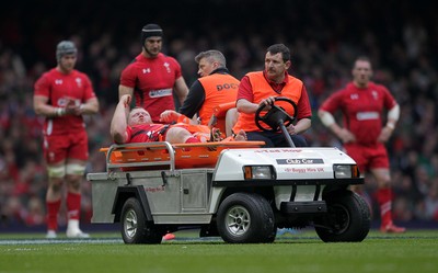 140315 - Wales v Ireland - RBS 6 Nations - Samson Lee of Wales is taken off the pitch injured