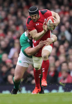 140315 - Wales v Ireland - RBS 6 Nations - Sam Warburton of Wales is tackled by Jack McGrath of Ireland