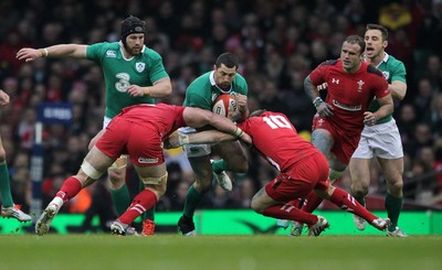 140315 - Wales v Ireland - RBS 6 Nations - Rob Kearney of Ireland is tackled by Dan Lydiate and Dan Biggar of Wales