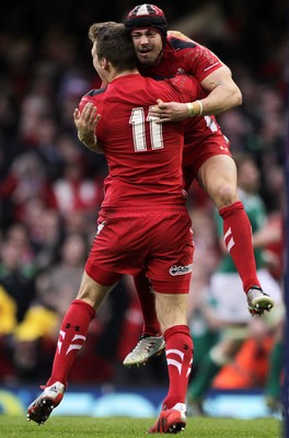 140315 - Wales v Ireland - RBS 6 Nations - Liam Williams  and Leigh Halfpenny of Wales celebrate the victory at full time