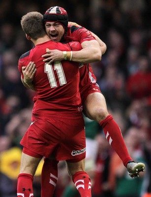 140315 - Wales v Ireland - RBS 6 Nations - Liam Williams  and Leigh Halfpenny of Wales celebrate the victory at full time