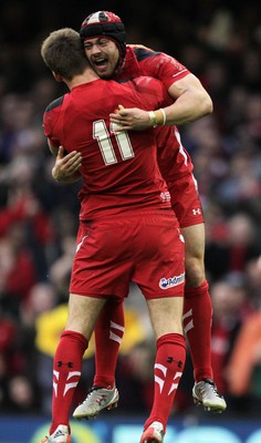 140315 - Wales v Ireland - RBS 6 Nations - Liam Williams  and Leigh Halfpenny of Wales celebrate the victory at full time