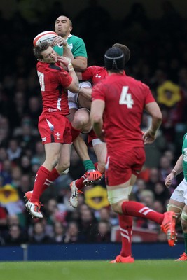 140315 - Wales v Ireland - RBS 6 Nations - Dan Biggar of Wales and Rob Kearney of Ireland jump for the ball