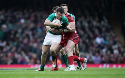 140315 - Wales v Ireland - RBS 6 Nations - Peter OÕMahony of Ireland is tackled by Dan Biggar of Wales