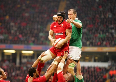 140315 - Wales v Ireland - RBS 6 Nations -Sam Warburton of Wales steals lineout ball from Devin Toner of Ireland