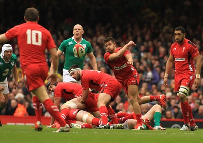 140315 - Wales v Ireland - RBS 6 Nations -Rhys Webb of Wales gets the ball away