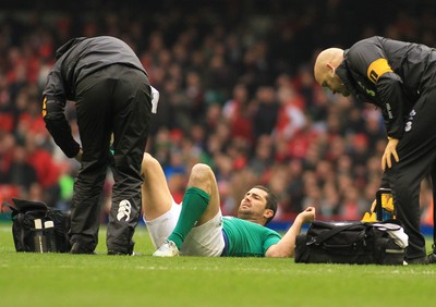 140315 - Wales v Ireland - RBS 6 Nations -Rob Kearney of Ireland receives treatment