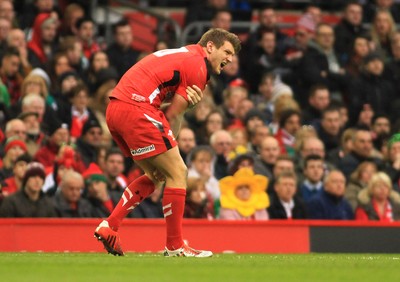 140315 - Wales v Ireland - RBS 6 Nations -Dan Biggar of Wales receives an injury