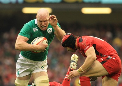 140315 - Wales v Ireland - RBS 6 Nations -Paul O'Connell of Ireland takes on Leigh Halfpenny of Wales