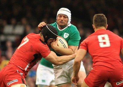 140315 - Wales v Ireland - RBS 6 Nations -Rory Best of Ireland is tackled by Sam Warburton of Wales