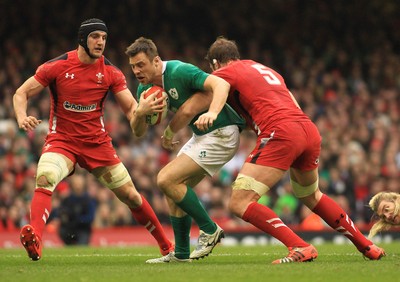 140315 - Wales v Ireland - RBS 6 Nations -Tommy Bowe of Ireland is tackled by Alun Wyn Jones of Wales