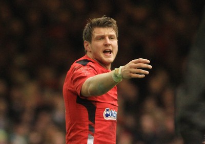 140315 - Wales v Ireland - RBS 6 Nations -Dan Biggar of Wales directs the defense