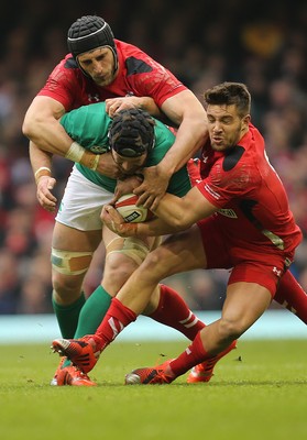 140315 - Wales v Ireland, RBS 6 Nations 2015 - Sean OÕBrien of Ireland is tackled by Luke Charteris of Wales and Rhys Webb of Wales