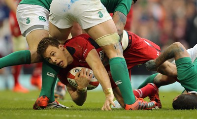 140315 - Wales v Ireland, RBS 6 Nations 2015 - Liam Williams of Wales looks for the try line after being tackled by Rob Kearney of Ireland