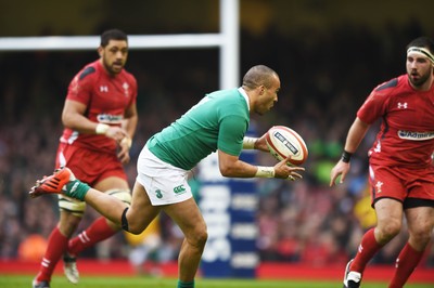 140315 - Wales v Ireland - RBS Six Nations - Ireland's Simon Zebo tries to break the Wales defence