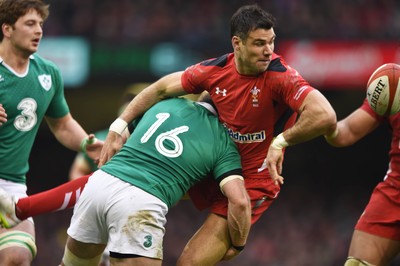 140315 - Wales v Ireland - RBS Six Nations - Wales  Mike Phillips releases the ball as Sean Cronin tackles