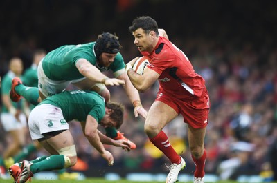 140315 - Wales v Ireland - RBS Six Nations - Wales  Mike Phillips leaves the Irish defense in tatters