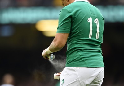 140315 - Wales v Ireland - RBS Six Nations - Simon Zebo of Ireland using the magic spray