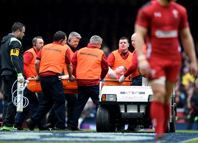 140315 - Wales v Ireland - RBS Six Nations - Samson Lee of Wales is taken off the pitch injured