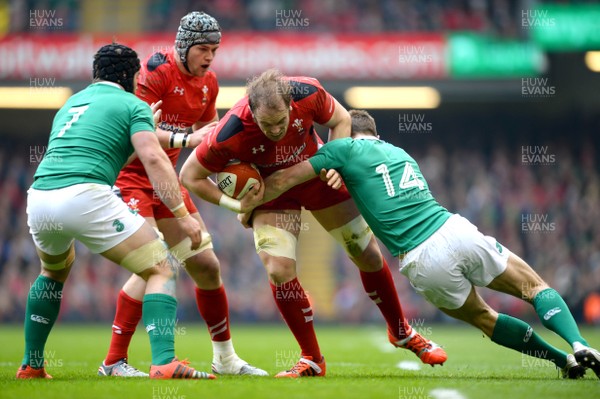 140315 - Wales v Ireland - RBS 6 Nations 2015 -Alun Wyn Jones of Wales is tackled by Tommy Bowe of Ireland