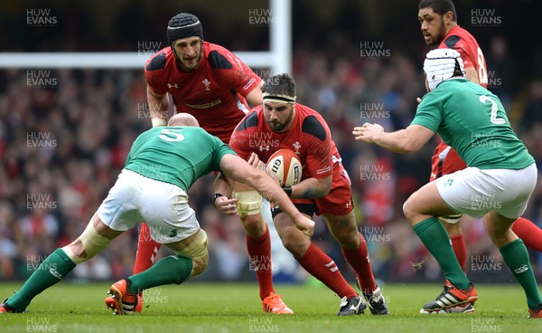 140315 - Wales v Ireland - RBS 6 Nations 2015 -Scott Baldwin of Wales is tackled by Paul O’Connell of Ireland