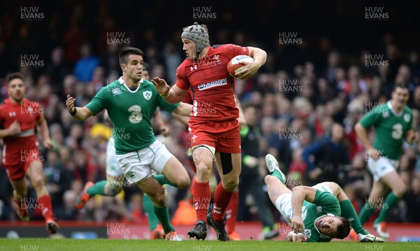 140315 - Wales v Ireland - RBS 6 Nations 2015 -Jonathan Davies of Wales is tackled by Conor Murray and Tommy Bowe of Ireland