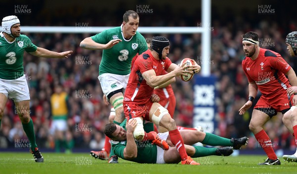 140315 - Wales v Ireland - RBS 6 Nations 2015 -Sam Warburton of Wales is tackled by Mike Ross of Ireland