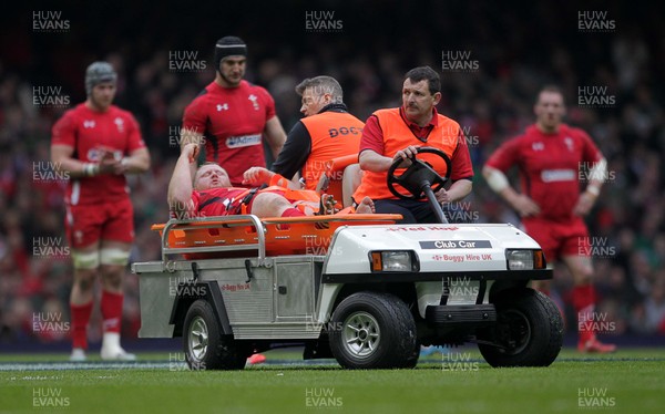 140315 - Wales v Ireland - RBS 6 Nations - Samson Lee of Wales is taken off the pitch injured