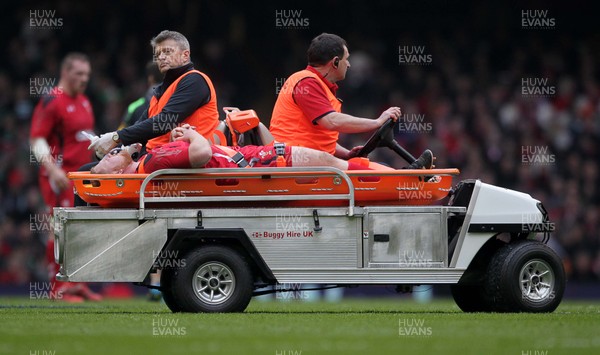 140315 - Wales v Ireland - RBS 6 Nations - Samson Lee of Wales is taken off the pitch injured