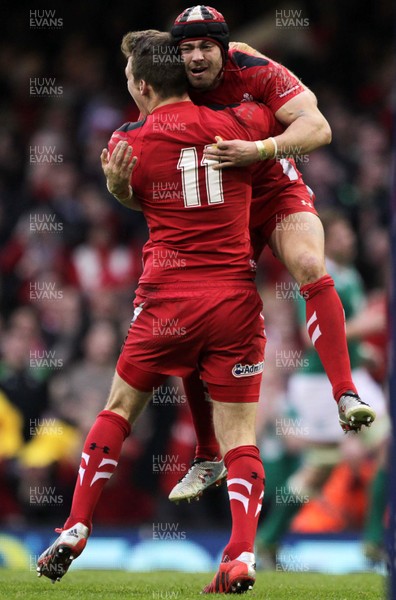 140315 - Wales v Ireland - RBS 6 Nations - Liam Williams  and Leigh Halfpenny of Wales celebrate the victory at full time