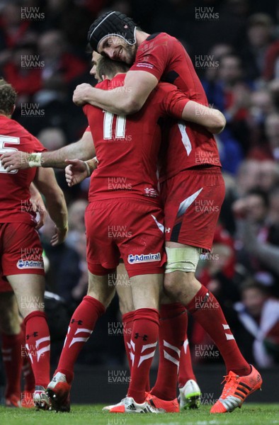 140315 - Wales v Ireland - RBS 6 Nations - Liam Williams and Luke Charteris of Wales celebrate at full time