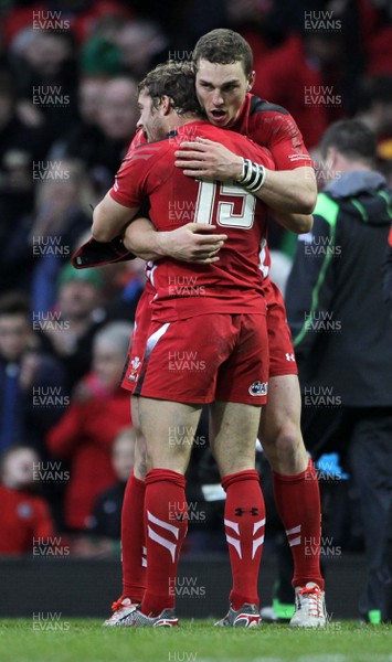 140315 - Wales v Ireland - RBS 6 Nations - Leigh Halfpenny and George North of Wales at full time